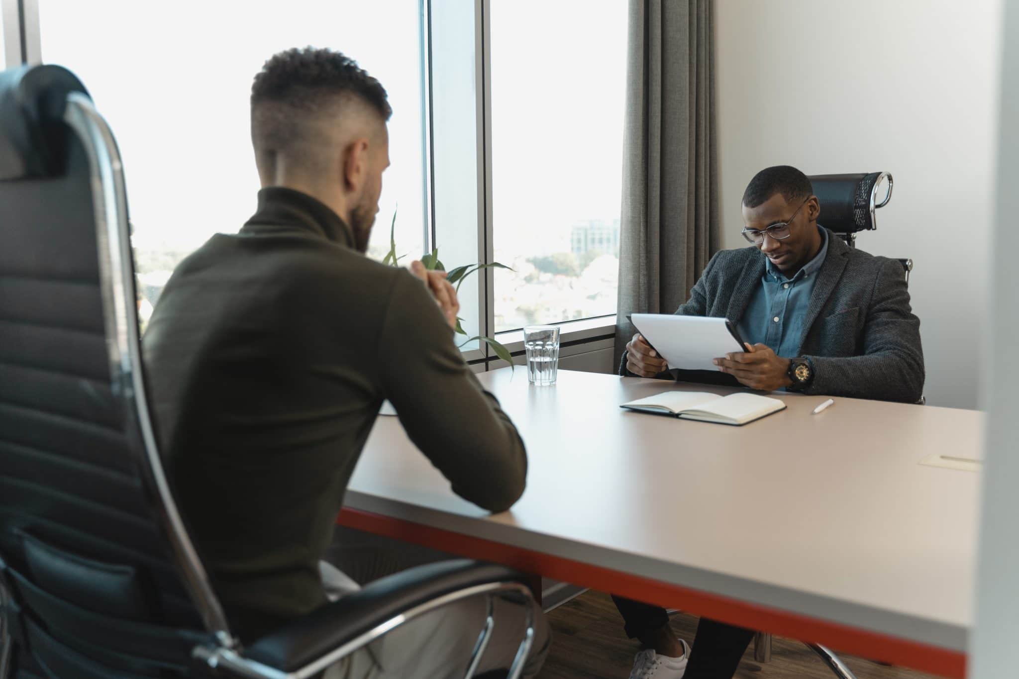 How to Sit During a Job Interview [Yes, It's Important] - Bizness ...
